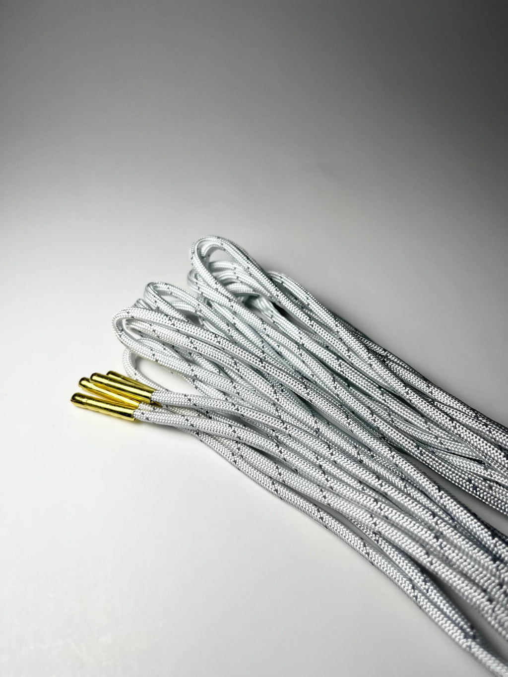 Reflective Paracord Roller Skate Laces by Drip Laces
